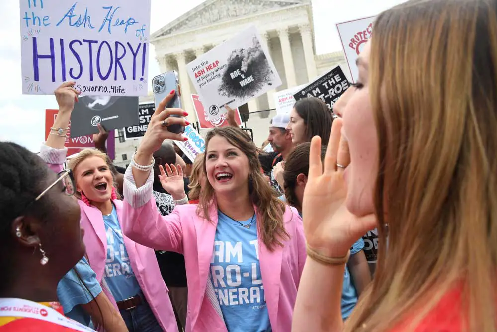 Anti-abortion protestors celebrate the overturning of Roe v. Wade outside the US Supreme Court on June 24. 