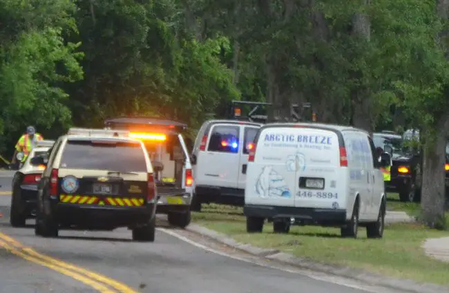 The Arctic Breeze van to the right was involved in a collision with a flagman on a resurfacing project on Colbert Lane in Palm Coast Wednesday afternoon. (c FlaglerLive)