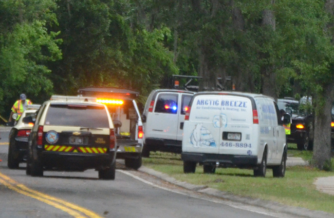 The Arctic Breeze van to the right was involved in a collision with a flagman on a resurfacing project on Colbert Lane in Palm Coast Wednesday afternoon. (c FlaglerLive)