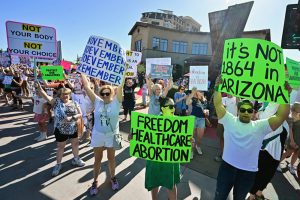 Pro-abortion rights demonstrators rally in Scottsdale, Ariz., on April 15, 2024.