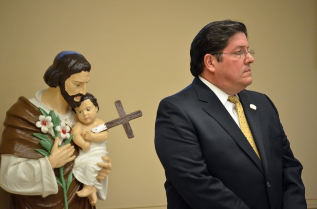 Armando Martinez at Thursday evening's town hall meeting on the Plantation Bay, which ended just as the Satellite Beach City Council meeting began. The Plantation Bay meeting was held at St. Mary's Catholic Church in Korona. (© FlaglerLive)