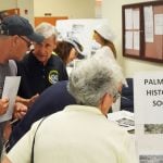 Art Dycke, center, during a Flagler County Centennial event in 2017. (© FlaglerLive)