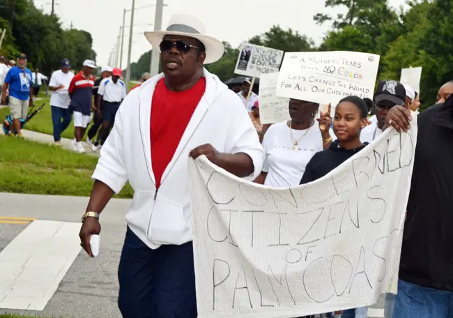 Just 10 weeks ago, Arthur Jones was among the leaders of a march in Palm Coast, in support of   changes in Florida's Stand Your Ground law in the wake of the George Zimmerman verdict. Jones sang hymns and civil rights chants. (© FlaglerLive)