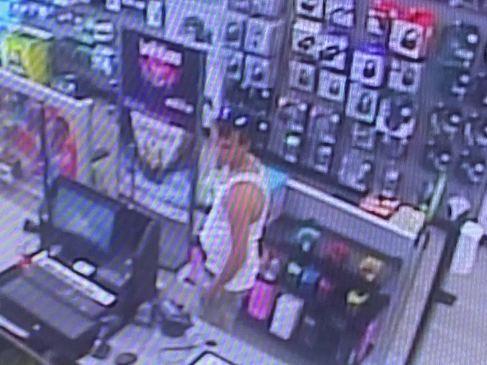 The assailant in a surveillance video capture at the store.  (FCSO)