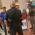 A scene at the Aug. 17 school board meeting in Bunnell. The meeting had to be recessed for half an hour because of hostility and chaos. (© FlaglerLive)