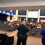 The audience at an August 2021 Flagler County School Board meeting had to be cleared from the room because it got unruly, before it was allowed back in. (© FlaglerLive)