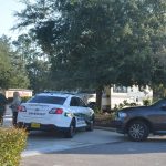 The scene outside Auto Zone off Belle Terre Parkway this morning, where a man was reported to have died in an RV that had been traveling from South Florida through Flagler County. (© FlaglerLive)