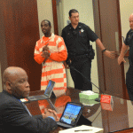 Cornelius Baker arriving for his last hearing in Flagler County Circuit Court in February. (© FlaglerLive)