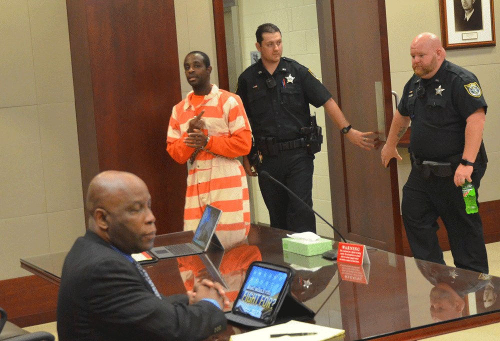 Cornelius Baker arriving for his last hearing in Flagler County Circuit Court in February. (© FlaglerLive)