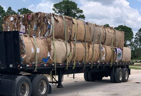Flagler Beach's Sanitation Department is now in the cardboard baling business: it placed 18 tons of cardboard, or 24 bales, on a truck last month when the new system kicked off. (Rob Smith)