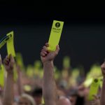 Attendees, or ‘messengers,’ hold up their ballots during the Southern Baptist Convention’s annual meeting in 2022. (AP Photo/Jae C. Hong)