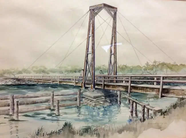 A beautiful original watercolor by Barbara Klein Craig, painted in 1992, of an old turnstile bridge over the Intracoastal. Flagler Beach Commissioners personally bought the watercolor at the Carver Gym Auction to benefit the Carver Center. The painting will now hang in Commission chambers in perpetuity. (© FlaglerLive)