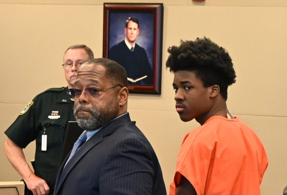  Damari Barnes, right, with his attorney, Steven Robinson, in court Monday. (© FlaglerLive)