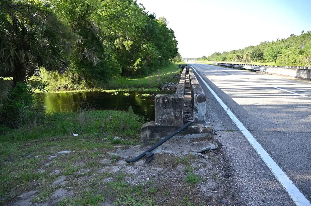 The man lost his life when his vehicle struck this concrete barrier head-on, on a bridge above Hulett Branch Creek on U.S. 1. (© FlaglerLive)