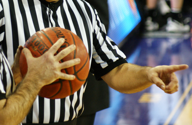 Local basketball referee Marion "Al Jennings, 66, of A-1 Officials Association, is accused of inappropriately touching a 14-year-old girl during a game. A-1's referees are dressed somewhat differently than the referees shown in the generic image above. (Harris Walker)