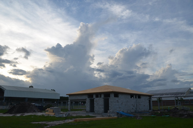 The new bathrooms under construction at the north edge of the Indian Trails Sports Complex, on school district grounds, with a hint of Winslow Homer in the air. (© FlaglerLive)
