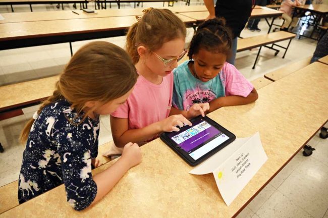 Battling: Team 12 members Molly Keefe, Aaliyah Williams and Aria-Rose Trinkle. (© FlaglerLive)