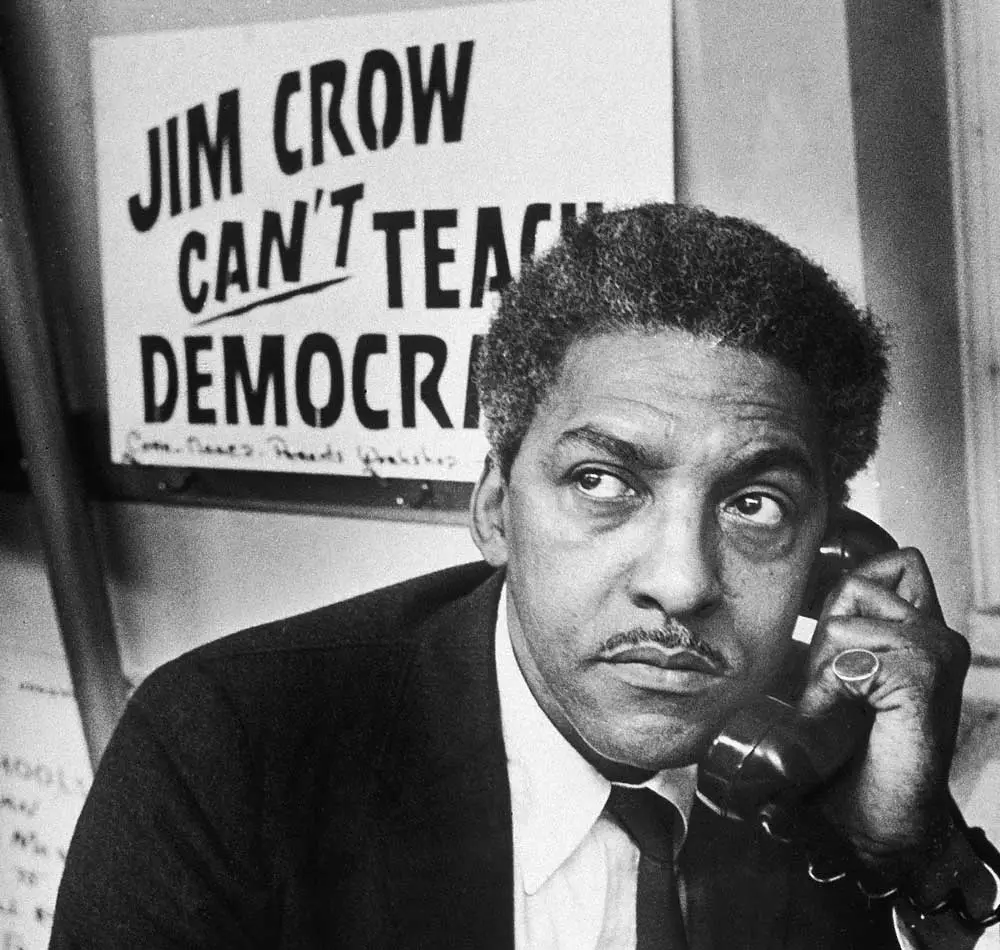 In this Feb. 2, 1964, image, Bayard Rustin talks on a telephone from a church in Brooklyn, New York. (Patrick A. Burns/New York Times Co./Getty Images)