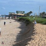 A beach carved out: the area just north of the Flagler Beach pier on Sunday, after it had lost even more sand over the past week. (© FlaglerLive)