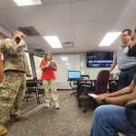 Flagler County Emergency Management Director Jonathan Lord and Emergency Management Planner Nealon Joseph getting briefed. (Flagler County)