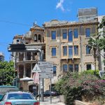 An apartment building on Rue Ashrafieh in beirut still bearing the marks of the 1975-1990 civil war. (© Xavier Deman for FlaglerLive)