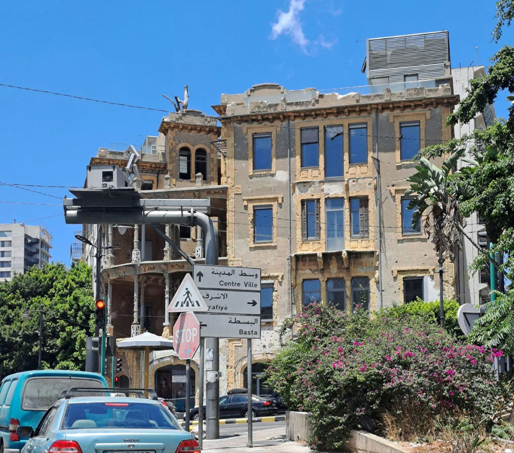 An apartment building on Rue Ashrafieh in beirut still bearing the marks of the 1975-1990 civil war. (© Xavier Deman for FlaglerLive)
