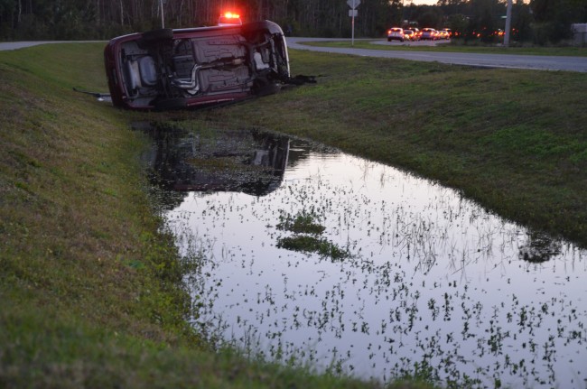 The wreck shut down the northbound lanes of Belle Terre Parkway. Click on the image for larger view. (© FlaglerLive)