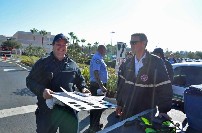 Berryhill with then-Lt. Richard Bennett of Flagler County Fire Rescue during a joint  exercise in 2014. Bennett has since retired as Battalion Chief. (© FlaglerLive)