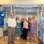 Clerk of Court Tom Bexley, right, with his staff at the grand opening.