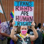 A California teacher takes part in a demonstration in September 2023 to support the rights of transgender people.