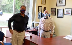 Dr. Stephen Bickel, left, the medical director at the Flagler and Volusia health departments, and Bob Snyder, who heads the Flagler Health Department, a branch of state government. (© FlaglerLive)