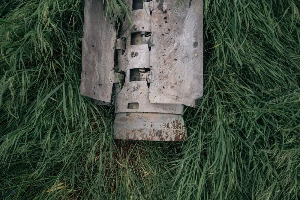 The remains of a rocket that carried cluster munitions found in a Ukrainian field. 