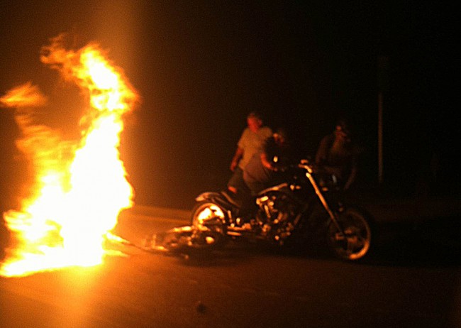 The motorcycle was almost immediately engulfed in flames. Click on the image for larger view. (© FlaglerLive)