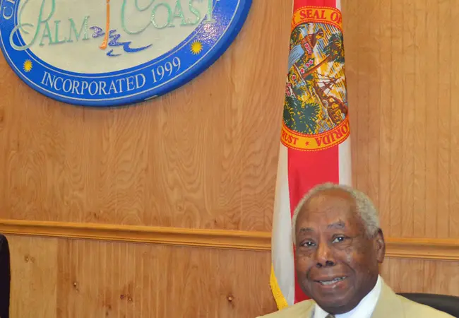 Bill Lewis, 83, a Palm Coast City Councilman since 2008, has missed the last four council meetings and been a n o-show at campaign events or on the trail because of illness. (© FlaglerLive)