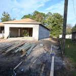 The house under construction at 98 Birchwood Drive and the concerns by neighboring residents about its elevation, which they say may cause flooding on their yards, has brought intense attention to an issue numerous Palm Coast residents have reported across the city as new homes have gone up. (© FlaglerLive)