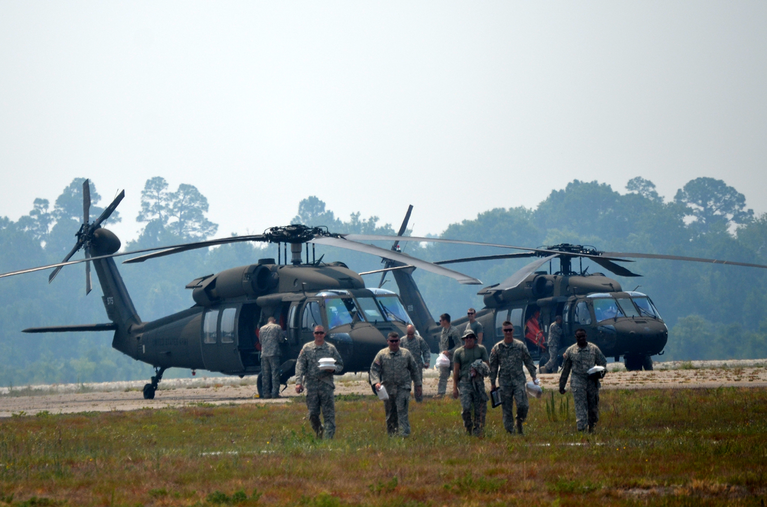 The right stuff: the Florida Army National Guard's Black Hawk crews right after arriving in Flagler County on Wednesday. (© FlaglerLive)