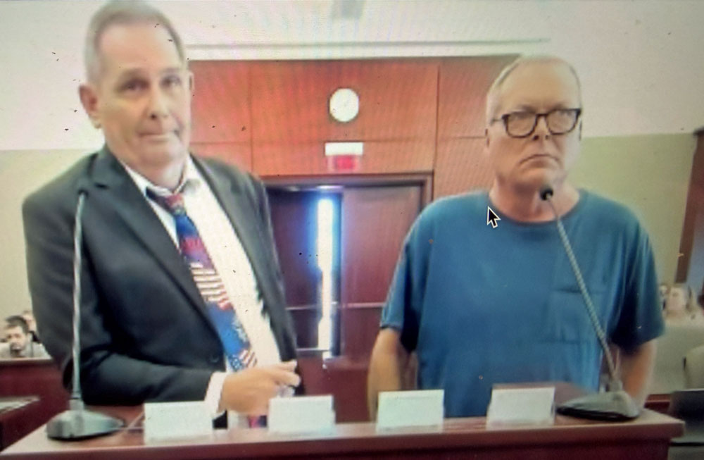 Howard Taft Blair, right, with his attorney at Blair's sentencing on Wednesday.