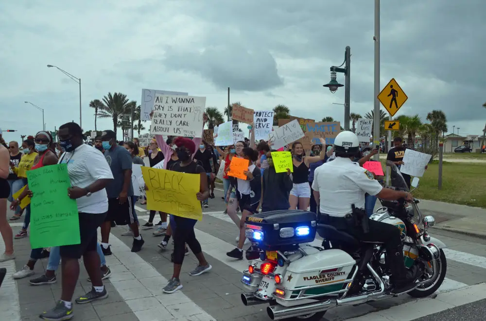 Last June's Black Lives Matter march in Flagler Beach. (© FlaglerLive)