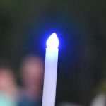 A blue light at a memorial for fallen officers. (© FlaglerLive)