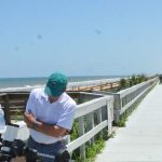 The area of the Flagler Beach boardwalk where Stephen Torma threatened people with a baseball bat and damaged the railing with it. File photo. (© FlaglerLive)