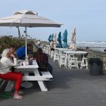 The boardwalk at the River-to-Sea Preserve in marineland has regained its old look, minus the tables and parasols, which belonged to Ragga Surf Cafe. After the county evicted the cafe from the Preserve, Ragga Surf set up operations in downtown St. Augustine. (© FlaglerLive)