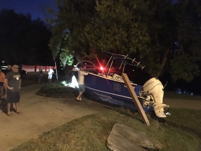 The boat knocked down a concrete culvert pillar and bent another on its way to  the sign. (© FlaglerLive)