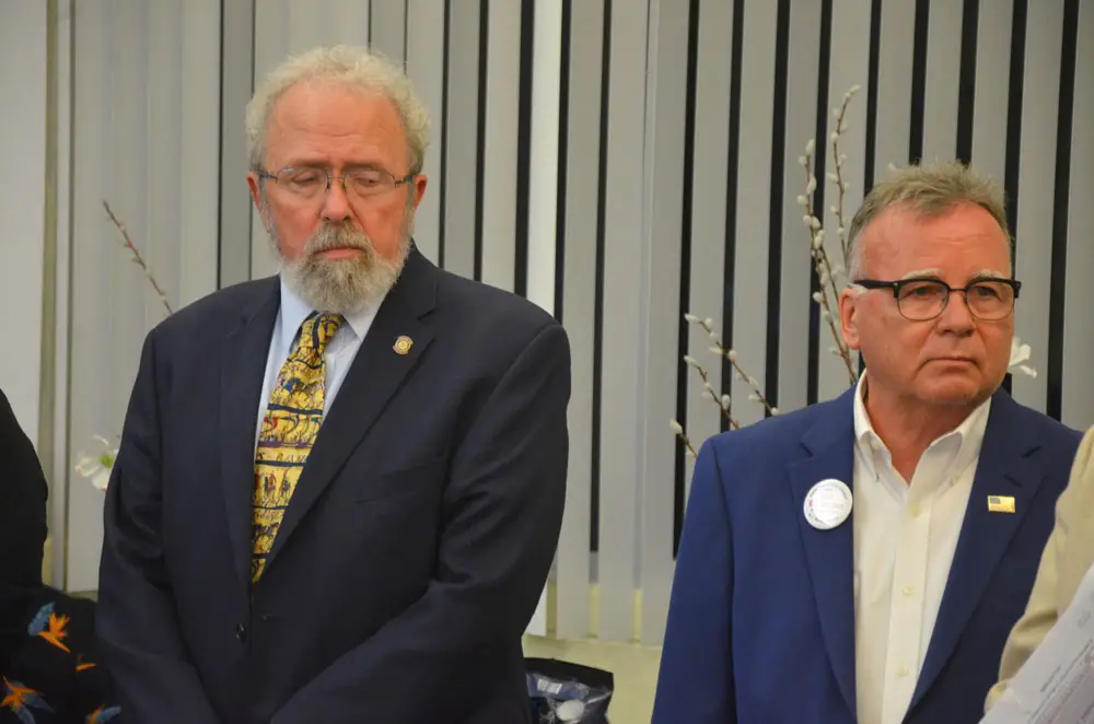Bob Cuff, left, has opted not to run for a second term, leaving the field open, for now, for newcomer Ed Danko. Cuff and Danko were at the same meeting at the Flagler Humane Society last November. (© FlaglerLive)