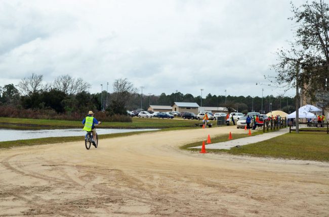 To maximize his mobility, Bob Snyder, director of the Flagler County Health Department, borrowed his wife's bike and accelerated from station to station, or on County Road 13 for traffic detection and wherever he was. was called or needed.  (© FlaglerLive)