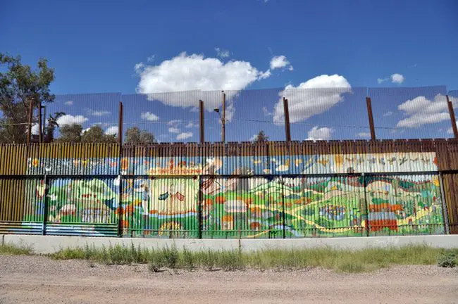 It won't look that pretty. The border fence on the Mexican side in Nogales, bordering Arizona. (Jonathan McIntosh)