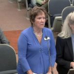 The Flagler County School District made its case again to the County Commission this evening for higher impact fees. From left, Superintendent Cathy Mittelstadt, coordinator of Planning and Intergovernmental Relations, and School Board Attorney Kristy Gavin. (© FlaglerLive via Flagler County TV)