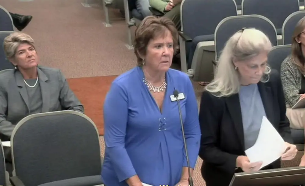 The Flagler County School District made its case again to the County Commission this evening for higher impact fees. From left, Superintendent Cathy Mittelstadt, coordinator of Planning and Intergovernmental Relations, and School Board Attorney Kristy Gavin. (© FlaglerLive via Flagler County TV)
