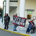 The epithet was brandished by individuals, many masked, most from out of town, who hurled obscenities at Flagler County students demonstrating against book bans at the Government Services Building earlier this month. (© FlaglerLive)