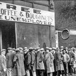 Men queueing up in a ‘breadline’ to receive free food in Chicago, 1931. Wikimedia Commons