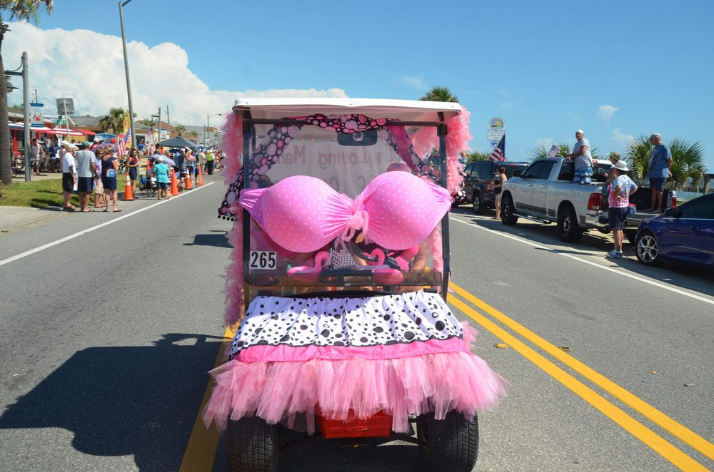 The most eye-catching float at a July 4 parade in Flagler Beach in 2018, in recognition of breast cancer awareness. (© FlaglerLive)